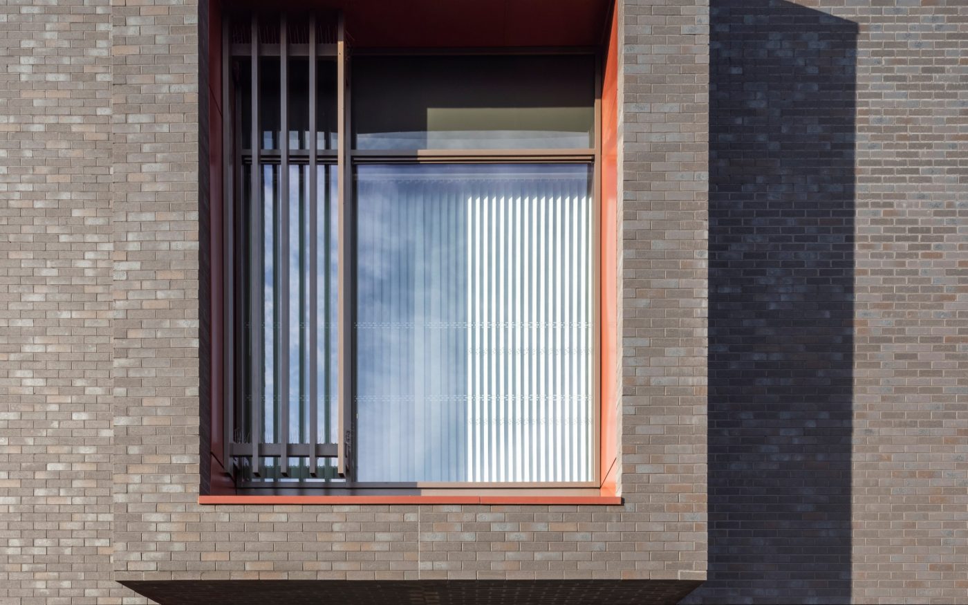 Close up of grey facade of the renovated fire station