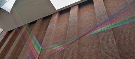 Atrium of Metropolitan Arts Centre with red brick walls in Belfast