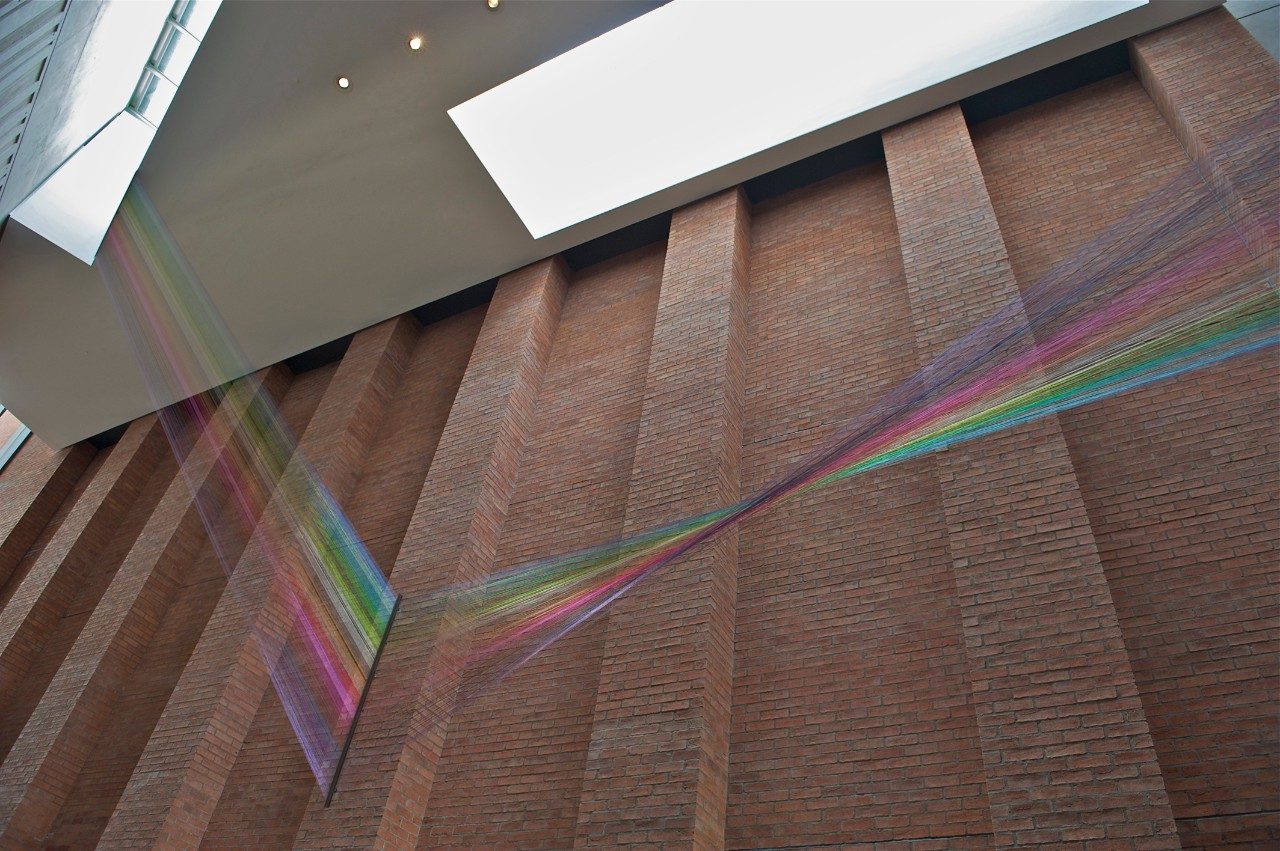 Atrium of Metropolitan Arts Centre with red brick walls