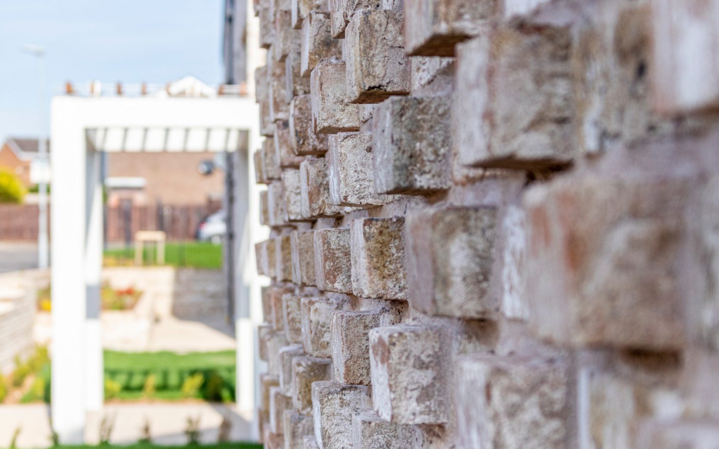 close up of the Con Mossa Brick facade