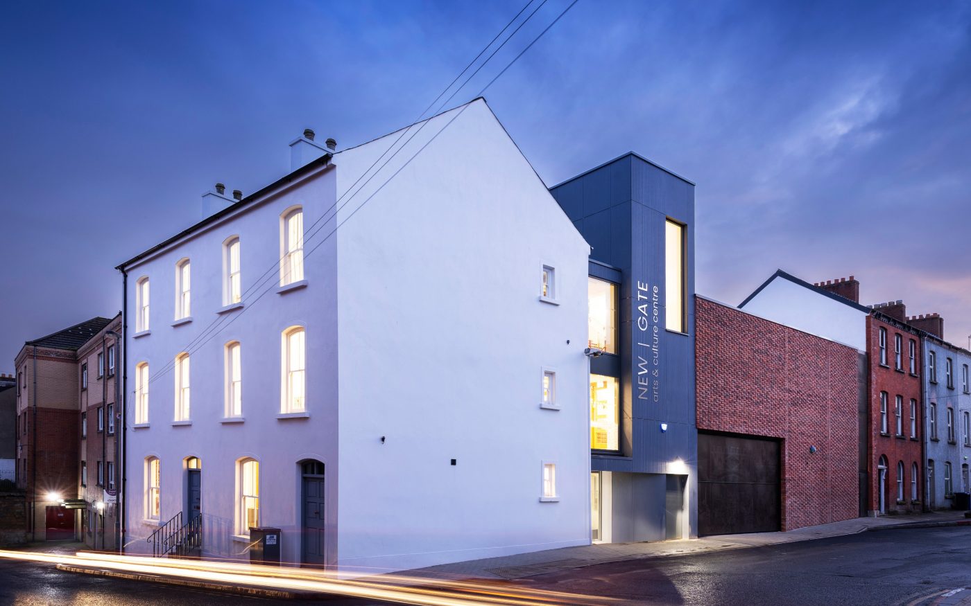 New Gate Arts and Crafts Centre in the evening with the lights on