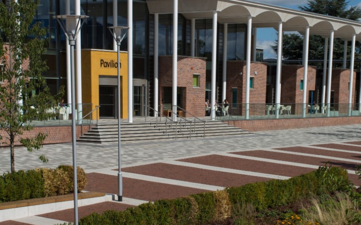 Paved area outside the entrance to the university