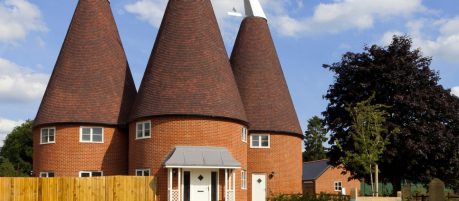 Three traditional oast houses with renovated clay tile roof
