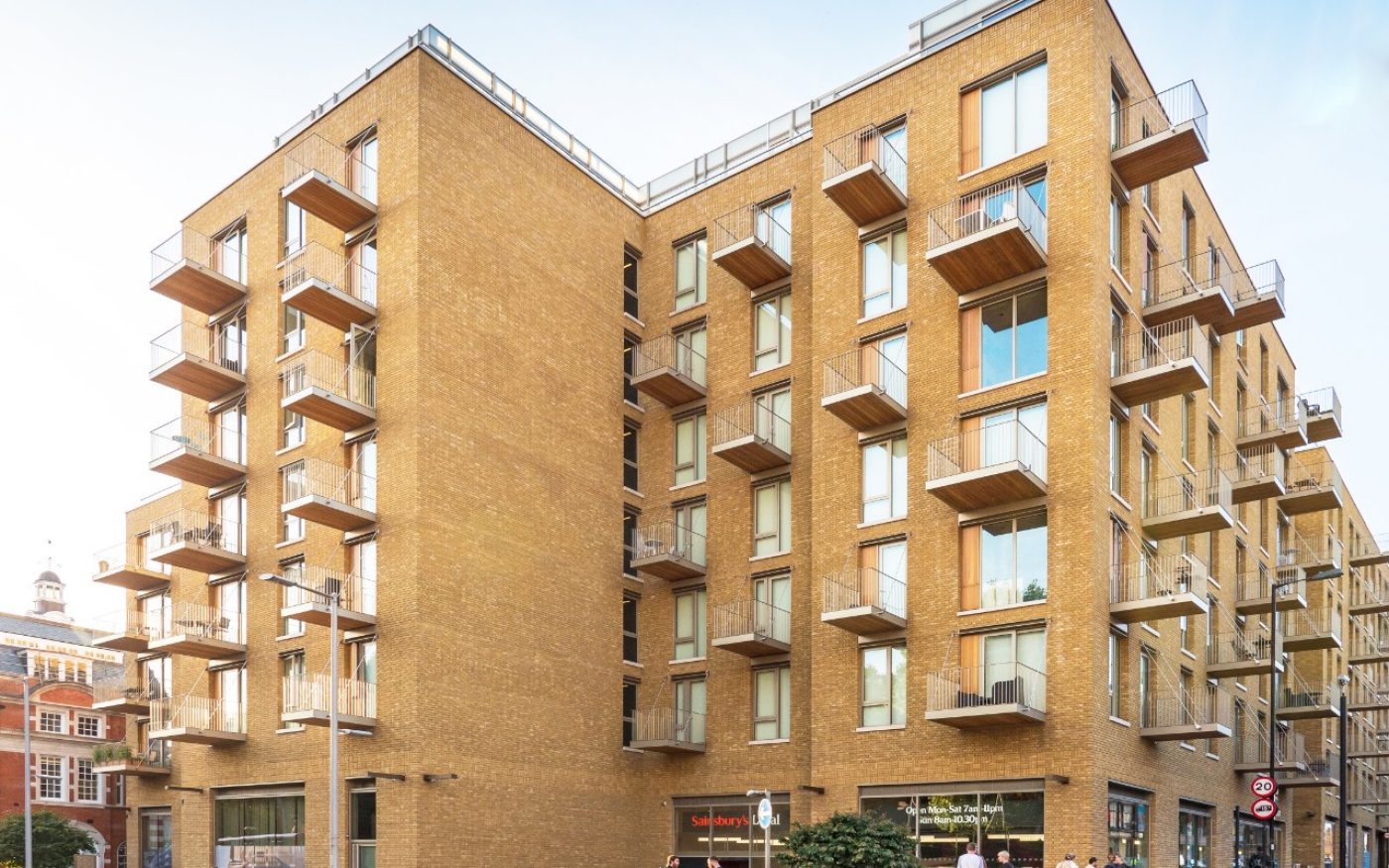 Modern London apartment building with yellow brick facade