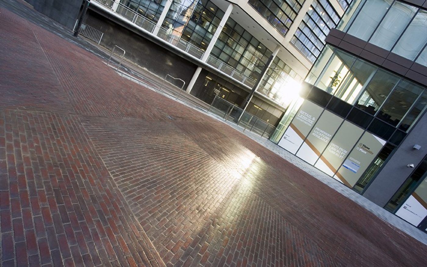 moden office complexes with sun shining through the windows