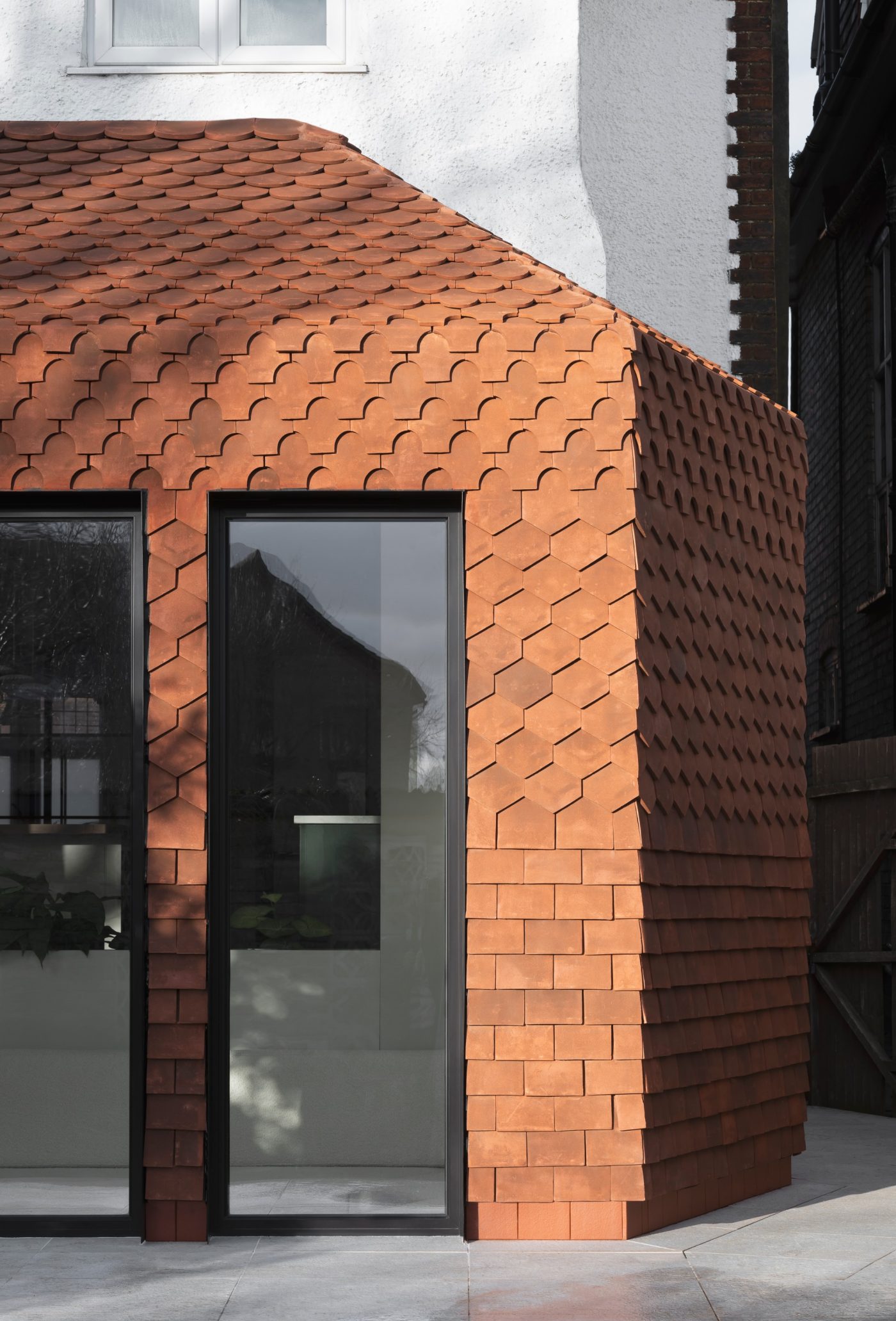 Modern extension with clay tile
