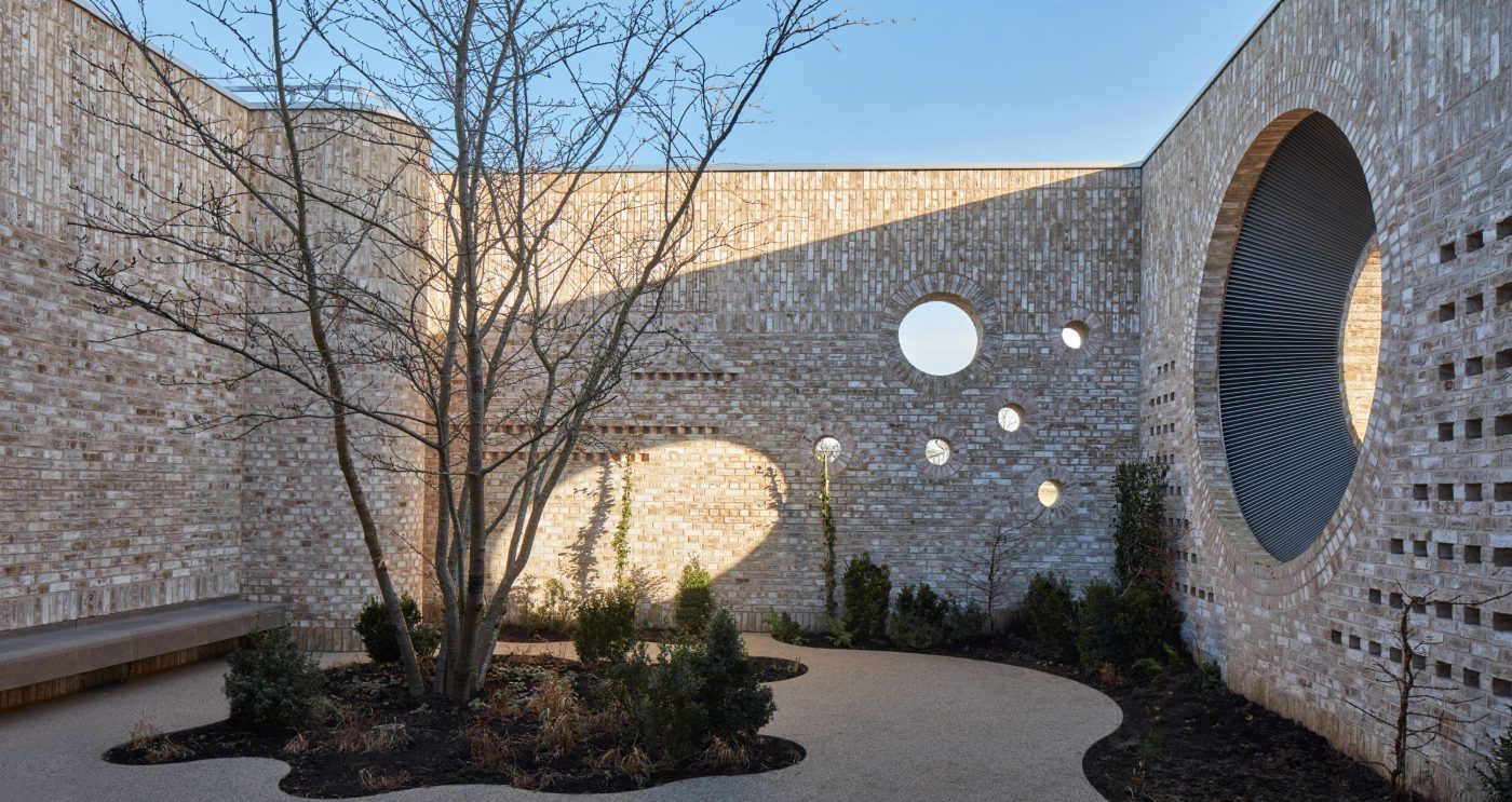 Modern brick courtyard at Storey's Field with circular detailing