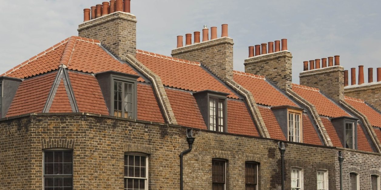 Renovated roof tiles on Spitalfields historic terraced buildings