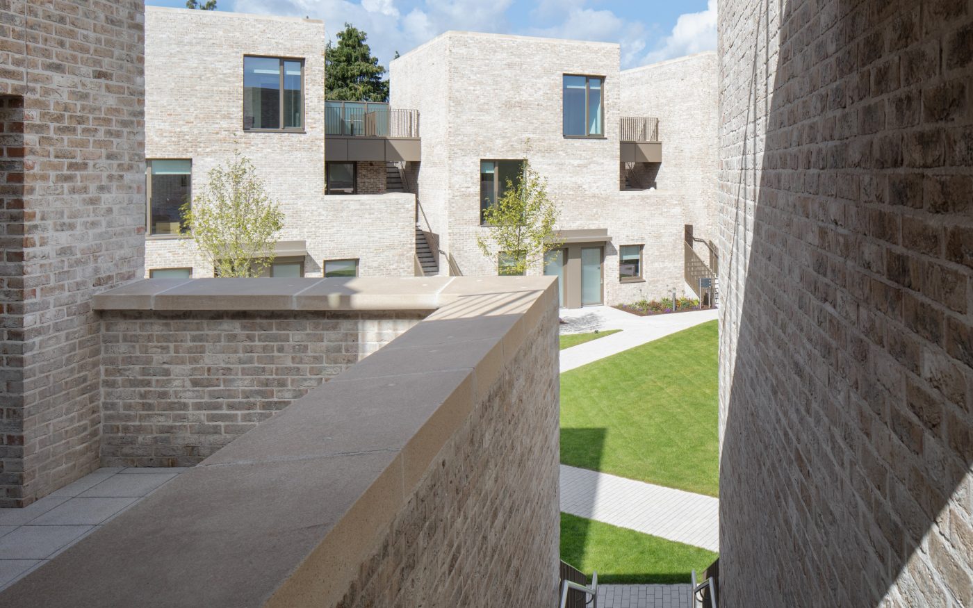 Stairway down to stunning landscaped communal area of apartment complex