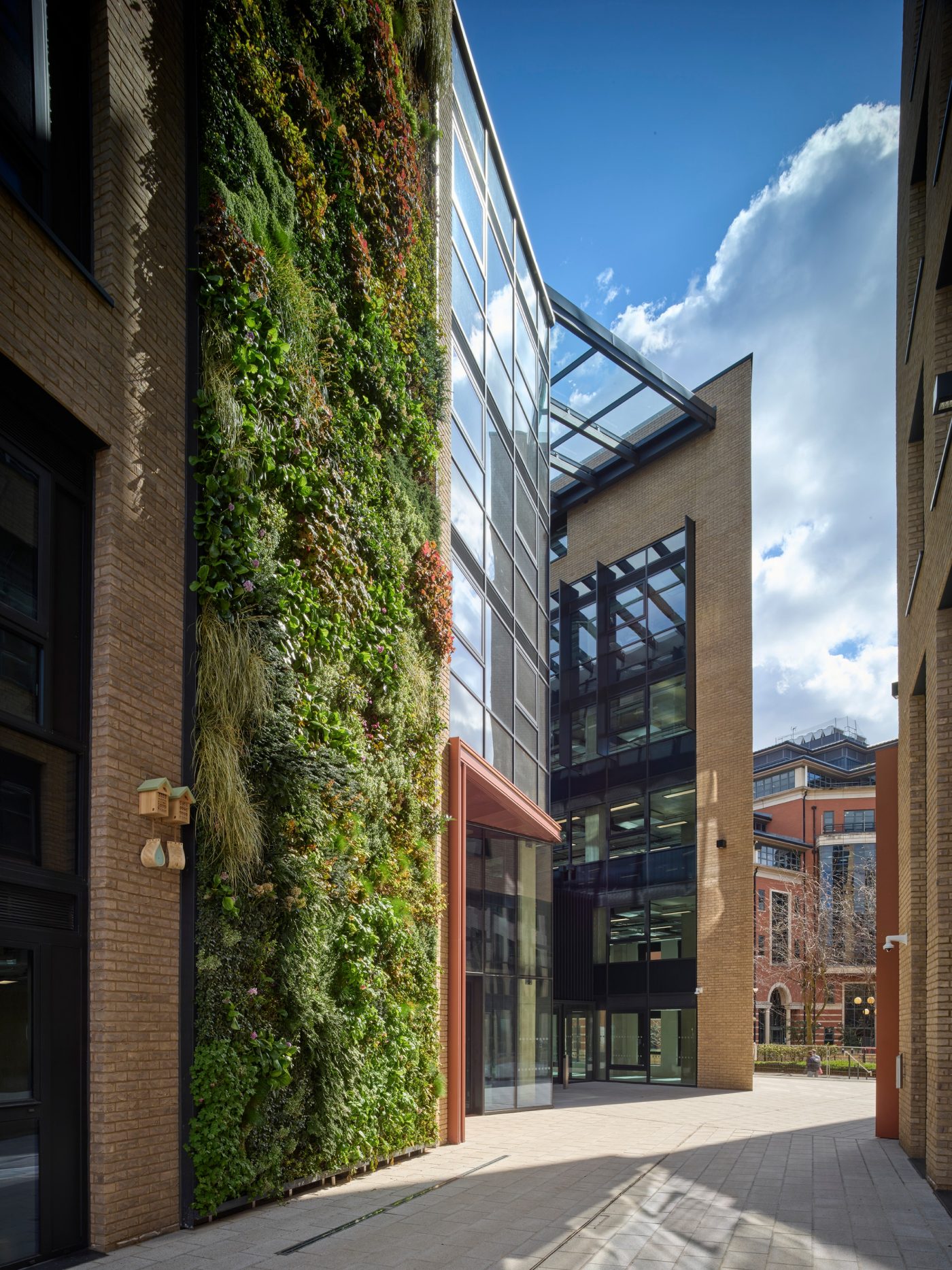 Modern office building with glass front and roof