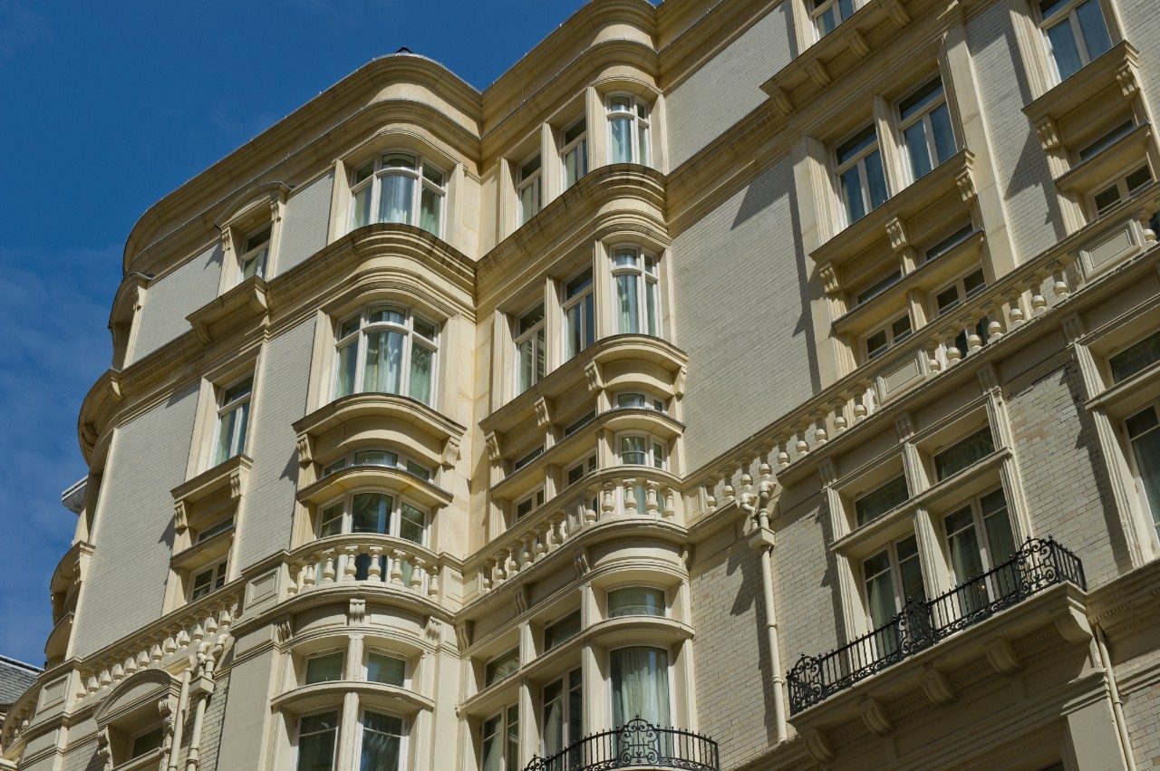 Ornate facade of the Savoy Hotel against blue sky