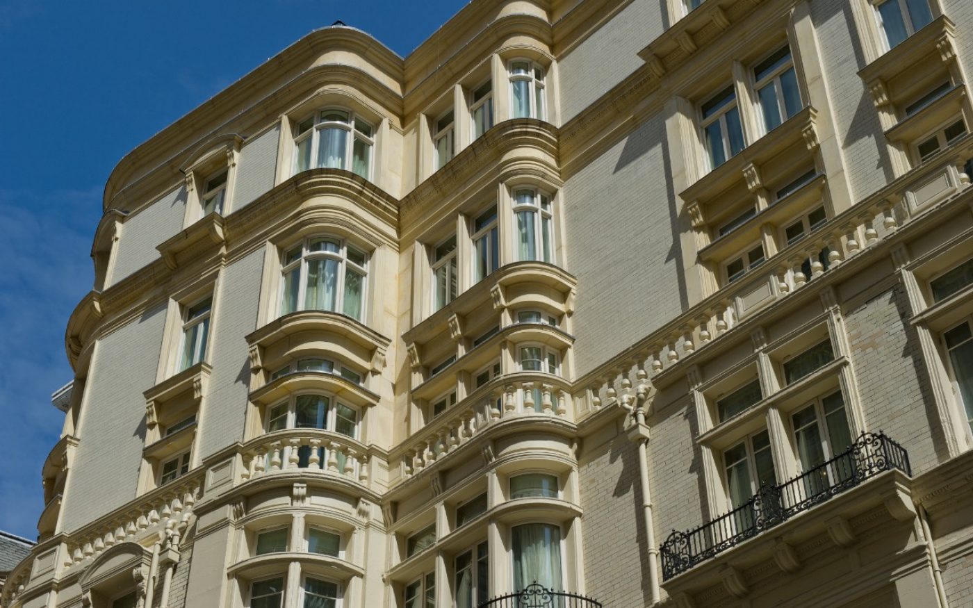 Ornate facade of the Savoy Hotel against blue sky using Wienerberger brick