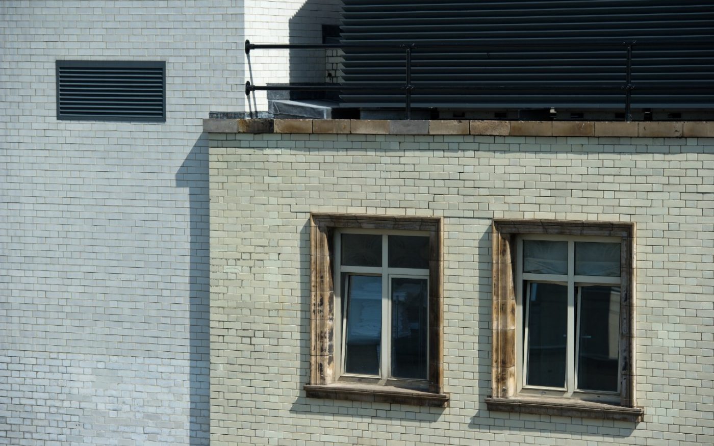 Two windows at the top of the Savoy Hotel