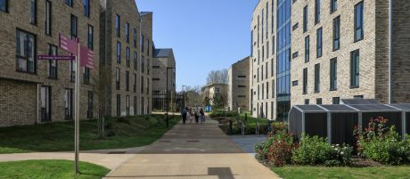 Students walking past the newly development accommodation in Manchester