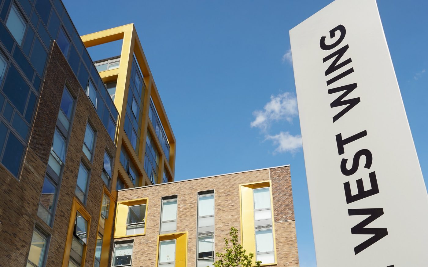 Modern student accommodation with yellow details