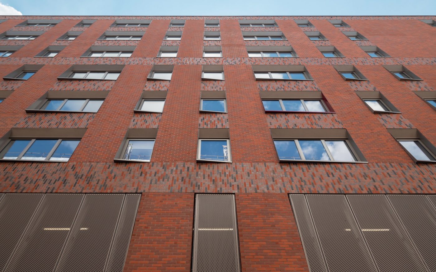 Corium brick tile cladding