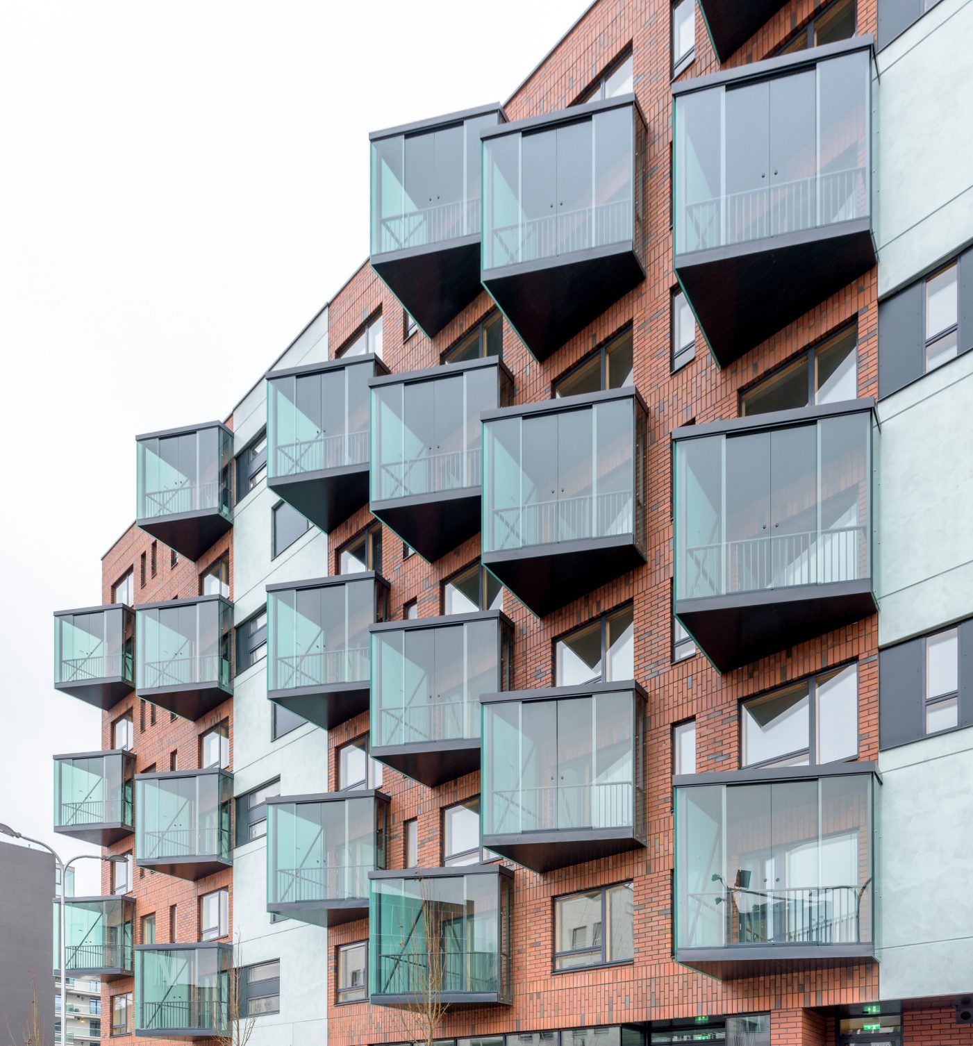 Apartment building in Tallinn, Estonia. Used materials: Terca  Red Flame  brick slips from Aseri plant (Estonia).