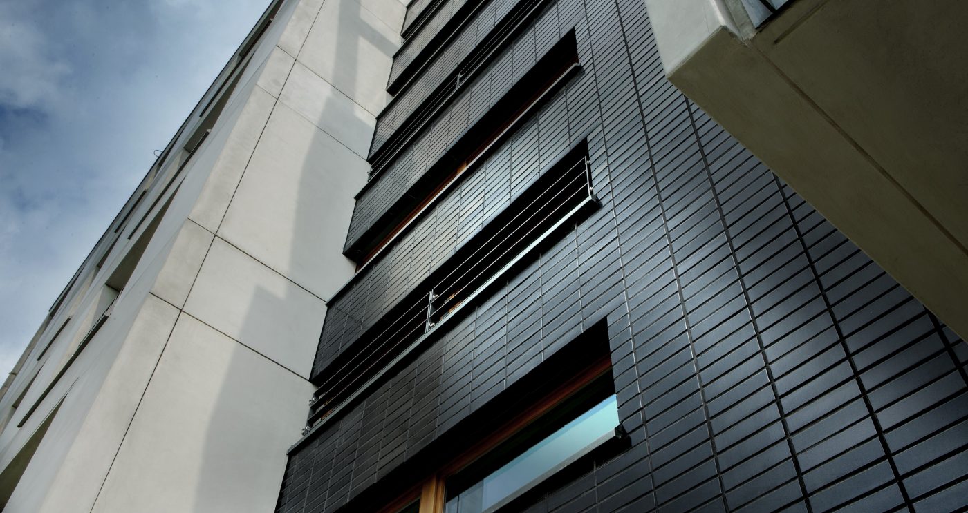 External brick slip cladding on modern high-rise building