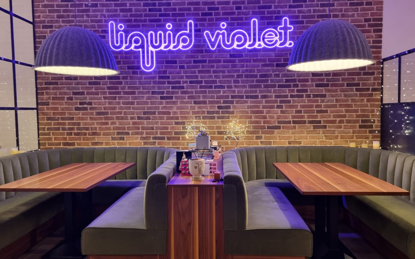 Restaurant interior with brick slip clad feature wall