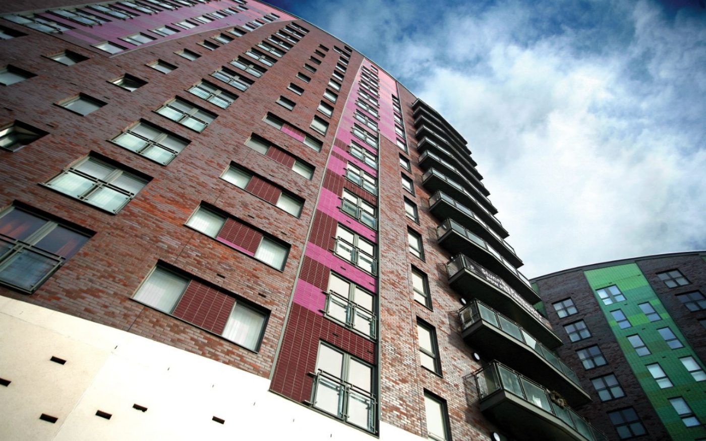 Corium brick tile cladding in pink and green on high rise buildings