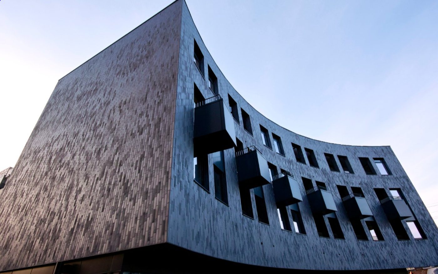 housing development built with Blue Multi with a dark grey mortar using the Corium system offering 145 affordable flats and houses, and 74 for private rent