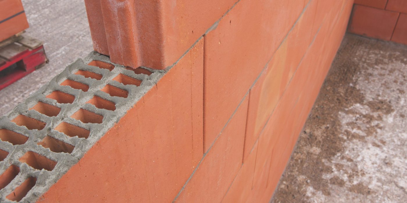 An image of Porotherm blocks being layed with ZeroPlus mortar.