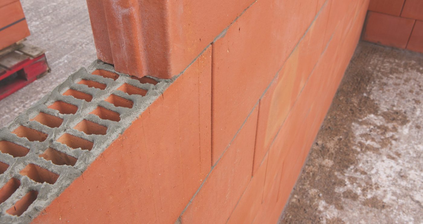 An image of Porotherm blocks being layed with ZeroPlus mortar.