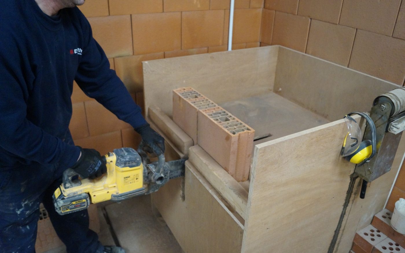 An image of a Porotherm block being cut. 