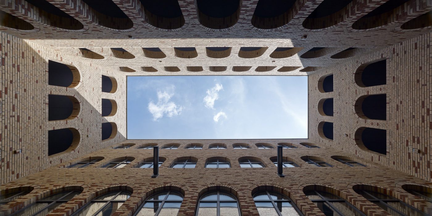 View of sky in brick courtyard