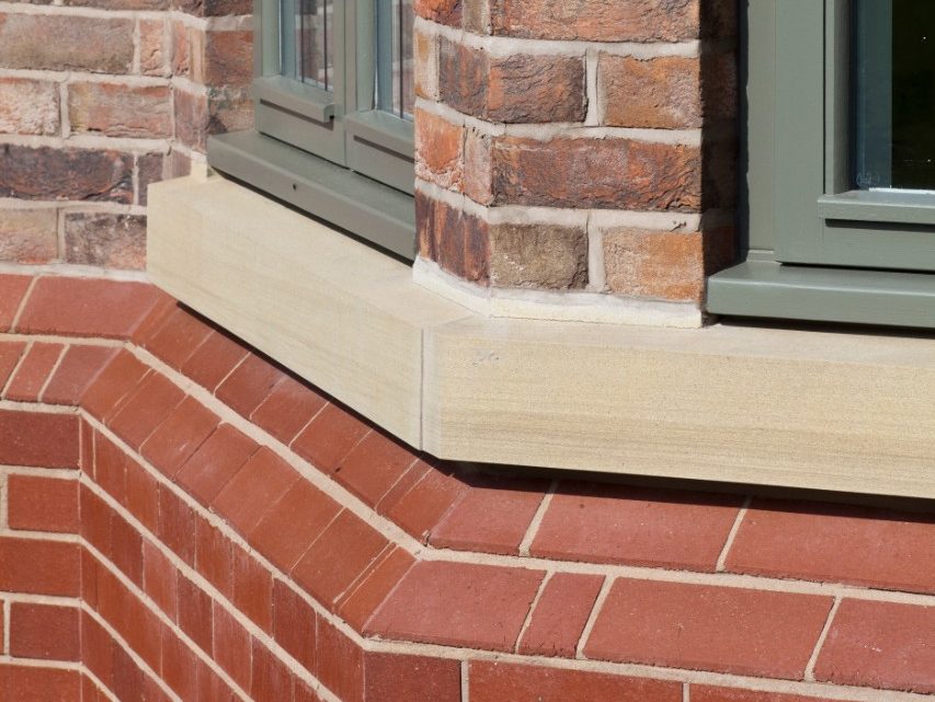 Close up of bay window made with special bricks