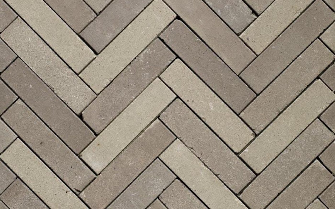Close up herringbone two tone grey pavers