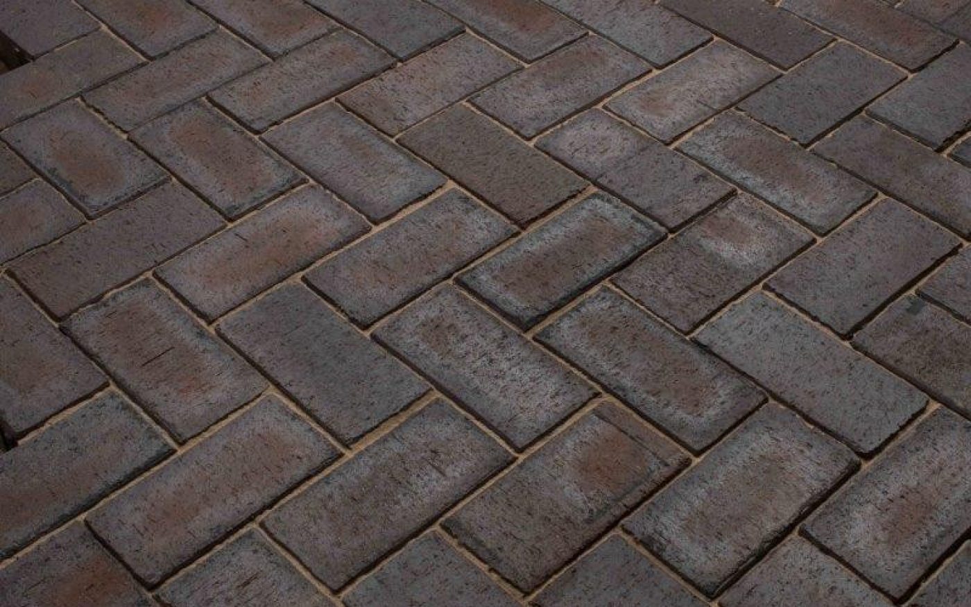 Dark grey pavers that are slightly textured