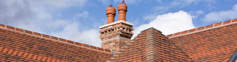 Clay roof tiles and chimney pots