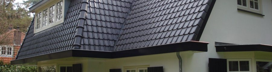Black roof tiles on modern residential building