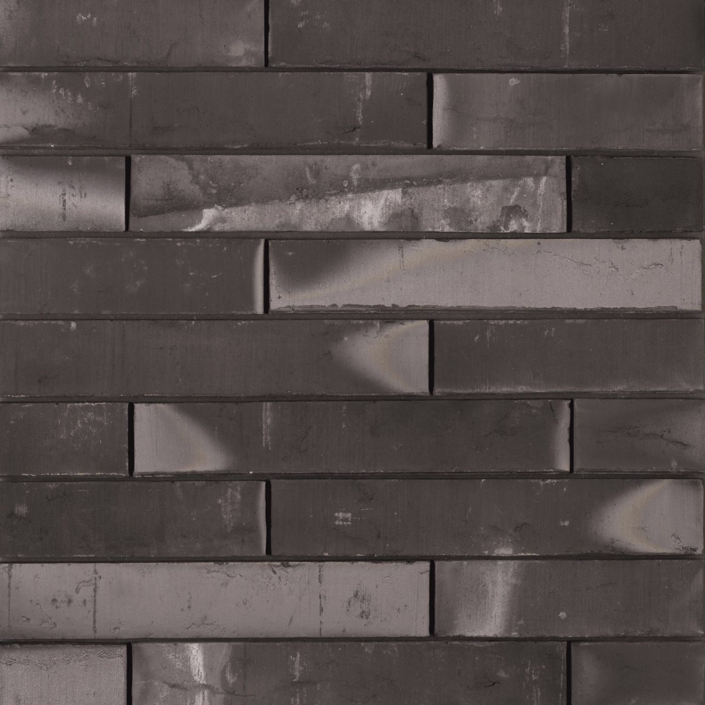 Section of a brick wall using Megaline Graphite Black.